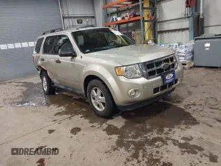 2011 Ford Escape XLT with VIN 1FMCU0D75BKB11168, listed as a IAAI auction lot 41327470 with 136,610 mi miles. Bid and sale history available at carsss.com. Image 1.