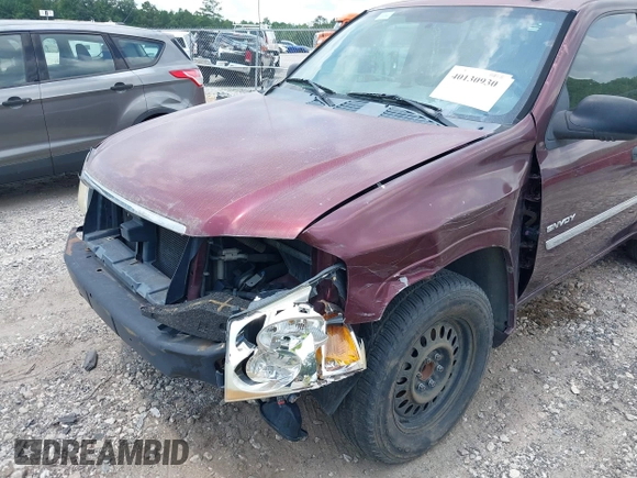 2006 GMC Envoy SLT with VIN 1GKDS13S262181019, listed as a IAAI auction lot 40130930 with 190,525 mi miles. Bid and sale history available at carsss.com. Image 6.