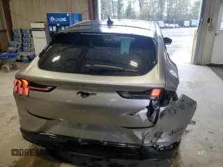 2021 Ford Mustang Mach-E Premium с VIN 3FMTK3R79MMA21145, выставлен на аукционе Copart как лот 52748285 с пробегом 55 497 миль миль и Списание • Salvage title. История ставок и продаж доступна на DreamBid. Изображение 6.