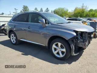 2015 Lexus RX 350 with VIN 2T2BK1BA4FC295693, listed as a Copart auction lot 54856955 with 104,430 mi miles and Salvage Title. Bid and sale history available at DreamBid. Image 4.