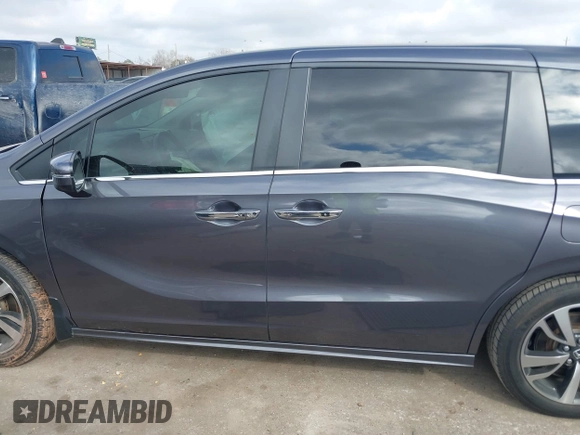 2022 Honda Odyssey Touring with VIN 5FNRL6H80NB023623, listed as a IAAI auction lot 41512586 with 63,329 mi miles and . Bid and sale history available at DreamBid. Image 15.