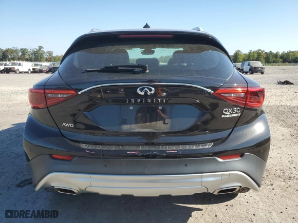 2018 Infiniti QX30 Premium with VIN SJKCH5CR8JA003282, listed as a Copart auction lot 70180874 with NaN miles and Salvage Title. Bid and sale history available at carsss.com. Image 6.