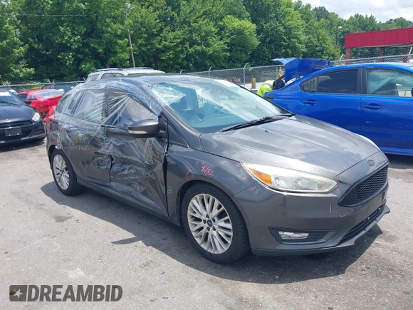 2016 Ford Focus Titanium with VIN 1FADP3N20GL275763, listed as a IAAI auction lot 42511959 with 124,891 mi miles and . Bid and sale history available at DreamBid. Image 1.