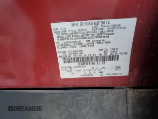 2014 Ford Taurus Limited with VIN 1FAHP2F81EG183128, listed as a Copart auction lot 82409384 with 107,624 mi miles and Salvage title. Bid and sale history available at DreamBid. Image 12.