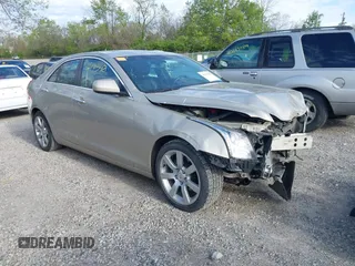 2014 Cadillac ATS Standard RWD z VIN 1G6AA5RA0E0103116, wystawiony jako IAAI lot #42116348 z przebiegiem 133 956 mil mil oraz . Historia ofert i sprzedaży dostępna na DreamBid. Obrazek 1.
