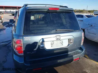 2007 Honda Pilot EX-L with VIN 5FNYF285X7B045780, listed as a IAAI auction lot 41324224 with 168,911 mi miles. Bid and sale history available at carsss.com. Image 16.