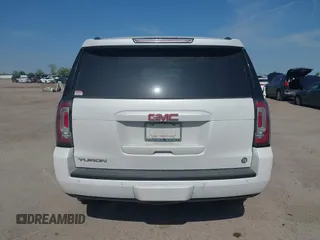 2017 GMC Yukon SLT z VIN 1GKS1BKC2HR378437, wystawiony jako IAAI lot #41923260 z przebiegiem 127 356 mil mil oraz . Historia ofert i sprzedaży dostępna na DreamBid. Obrazek 16.