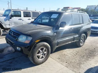 2002 Mitsubishi Montero LTD with VIN JA4MW51R72J014706, listed as a IAAI auction lot 41829993 with 201,091 mi miles. Bid and sale history available at carsss.com. Image 2.
