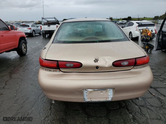 1996 Mercury Sable LS with VIN 1MELM53S0TA607489, listed as a Copart auction lot 85730734 with 113,214 mi miles and Salvage Title. Bid and sale history available at carsss.com. Image 6.