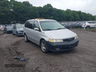 2003 Honda Odyssey EX z VIN 5FNRL18623B051129, wystawiony jako IAAI lot #40065538 z przebiegiem Nie podano mil oraz . Historia ofert i sprzedaży dostępna na DreamBid. Obrazek 1.