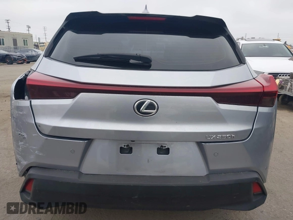 2023 Lexus UX 250h with VIN JTHX6JBH6P2143926, listed as a IAAI auction lot 42180779 with 65,106 mi miles and . Bid and sale history available at DreamBid. Image 17.