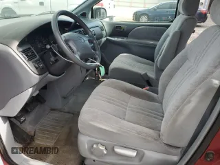 2000 Toyota Sienna LE with VIN 4T3ZF13C3YU284605, listed as a Copart auction lot 79405404 with 137,213 mi miles and Salvage Title. Bid and sale history available at carsss.com. Image 7.