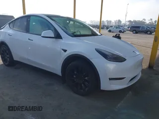 2023 Tesla Model Y Long Range with VIN 7SAYGAEE7PF766735, listed as a IAAI auction lot 41626651 with 21,983 mi miles. Bid and sale history available at carsss.com. Image 1.