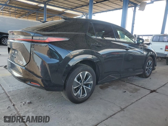 2023 Lexus RZ with VIN JTJAAAAB0PA015963, listed as a Copart auction lot 64261624 with 14,913 mi miles and Salvage Title. Bid and sale history available at carsss.com. Image 3.