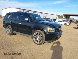 2014 Chevrolet Tahoe LT z VIN 1GNSCBE04ER237184, wystawiony jako IAAI lot #41228637 z przebiegiem 241 193 mil mil oraz . Historia ofert i sprzedaży dostępna na DreamBid. Obrazek 1.