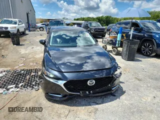 2022 Mazda 3 2.5 Turbo z VIN 3MZBPBAY9NM305244, wystawiony jako Copart lot #63661025 z przebiegiem 89 066 mil mil oraz Czysty tytuł • Clean title. Historia ofert i sprzedaży dostępna na DreamBid. Obrazek 5.
