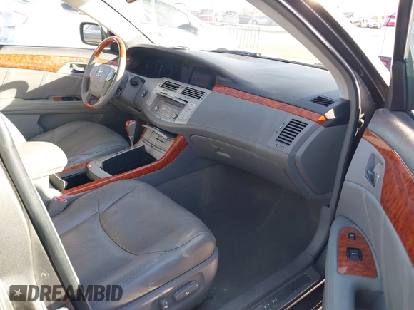 2006 Toyota Avalon XL with VIN 4T1BK36B86U140565, listed as a IAAI auction lot 41297851 with 186,025 mi miles. Bid and sale history available at carsss.com. Image 5.