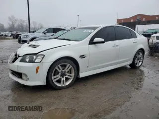 2009 Pontiac G8 with VIN 6G2ER57779L153098, listed as a Copart auction lot 43586215 with 136,321 mi miles and Salvage Title. Bid and sale history available at carsss.com. Image 1.