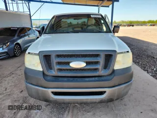 2007 Ford F-150 XL with VIN 1FTRF12277NA85488, listed as a Copart auction lot 60299875 with 219,127 mi miles and Salvage title. Bid and sale history available at DreamBid. Image 5.