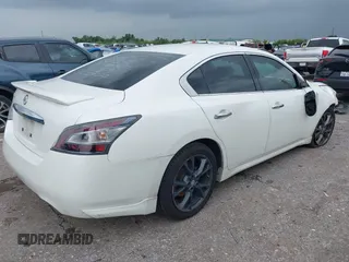 2014 Nissan Maxima S with VIN 1N4AA5AP6EC908751, listed as a IAAI auction lot 42624511 with 141,544 mi miles and . Bid and sale history available at DreamBid. Image 4.