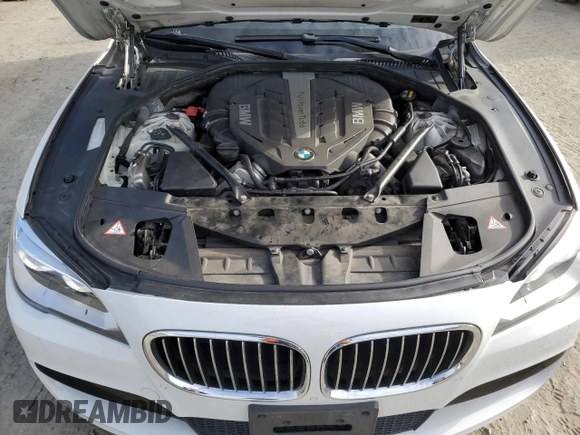 2015 BMW 7 Series 750i xDrive с VIN WBAYB6C50FD225492, выставлен на аукционе Copart как лот 50018225 с пробегом 76 059 миль миль и Списание • Salvage title. История ставок и продаж доступна на DreamBid. Изображение 11.