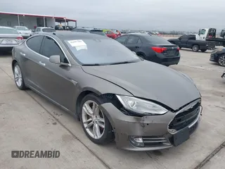 2015 Tesla Model S 85D with VIN 5YJSA1S24FF087048, listed as a IAAI auction lot 41097286 with 167,580 mi miles. Bid and sale history available at carsss.com. Image 1.
