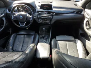 2018 BMW X1 xDrive28i with VIN WBXHT3C30J5K27472, listed as a Copart auction lot 52106655 with 120,936 mi miles and Clean Title. Bid and sale history available at carsss.com. Image 8.
