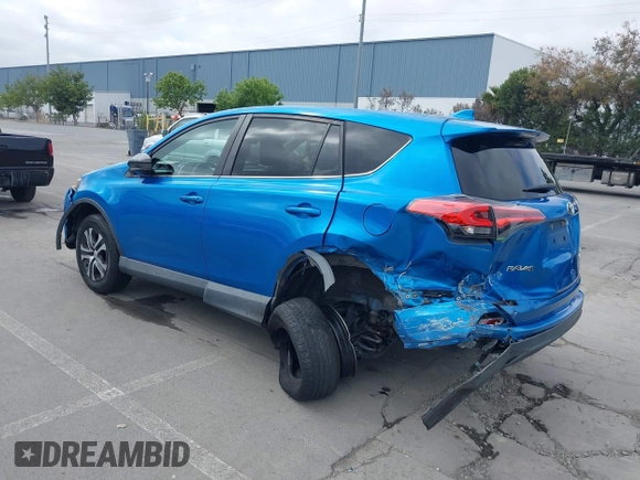 2018 Toyota RAV4 LE with VIN 2T3BFREV6JW740214, listed as a IAAI auction lot 42106349 with 105,831 mi miles and . Bid and sale history available at carsss.com. Image 18.
