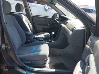 2001 Toyota Camry CE z VIN 4T1BG22K51U817811, wystawiony jako IAAI lot #42378357 z przebiegiem 347 362 mil mil oraz . Historia ofert i sprzedaży dostępna na DreamBid. Obrazek 5.