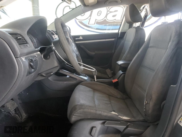 2010 Volkswagen Jetta S with VIN 3VWJZ7AJ9AM052569, listed as a Copart auction lot 59016965 with 166,950 mi miles and Salvage title. Bid and sale history available at DreamBid. Image 7.