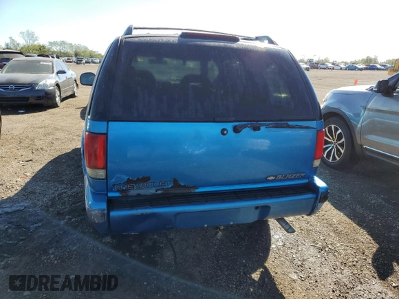 1995 Chevrolet Blazer с VIN 1GNDT13W6S2137053, выставлен на аукционе Copart как лот 73525544 с пробегом 188 033 миль миль и На запчасти • Non repairable. История ставок и продаж доступна на DreamBid. Изображение 6.