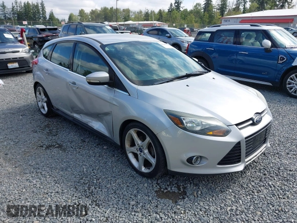 2014 Ford Focus Titanium with VIN 1FADP3N20EL160982, listed as a IAAI auction lot 42565322 with 112,551 mi miles and . Bid and sale history available at DreamBid. Image 1.