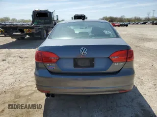 2013 Volkswagen Jetta SE z VIN 3VWDP7AJ8DM352028, wystawiony jako Copart lot #53182505 z przebiegiem 226 944 mil mil oraz Czysty tytuł • Clean title. Historia ofert i sprzedaży dostępna na DreamBid. Obrazek 6.