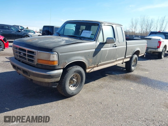 1996 Ford F-150 with VIN 1FTEX14N0TKA41914, listed as a IAAI auction lot 41724340 with 158,652 mi miles. Bid and sale history available at carsss.com. Image 2.
