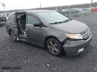 2013 Honda Odyssey Touring with VIN 5FNRL5H97DB002916, listed as a IAAI auction lot 41165678 with 244,070 mi miles. Bid and sale history available at carsss.com. Image 1.