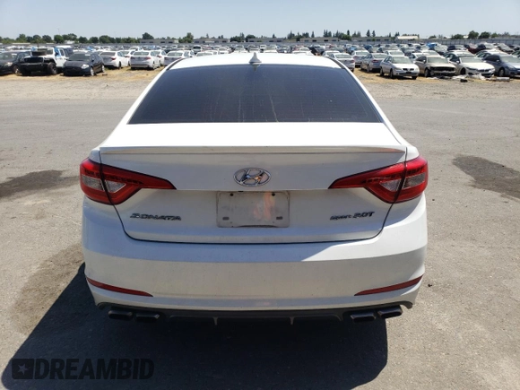2015 Hyundai Sonata Sport z VIN 5NPE34AB2FH223690, wystawiony jako Copart lot #58958085 z przebiegiem 140 527 mil mil oraz Szkoda całkowita • Salvage title. Historia ofert i sprzedaży dostępna na DreamBid. Obrazek 6.