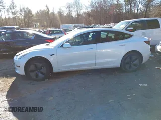 2018 Tesla Model 3 Long Range Battery with VIN 5YJ3E1EB5JF108633, listed as a IAAI auction lot 41016970 with 90,175 mi miles and . Bid and sale history available at DreamBid. Image 14.