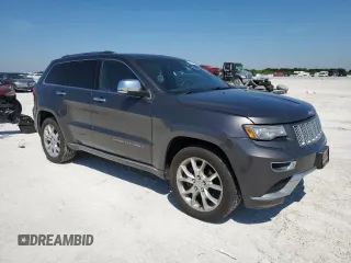 2014 Jeep Grand Cherokee Summit with VIN 1C4RJFJGXEC159438, listed as a Copart auction lot 50864595 with 134,558 mi miles and Salvage title. Bid and sale history available at DreamBid. Image 4.