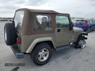 2003 Jeep Wrangler Sahara with VIN 1J4FA59S13P312830, listed as a Copart auction lot 52730955 with 99,247 mi miles and Salvage title. Bid and sale history available at DreamBid. Image 3.