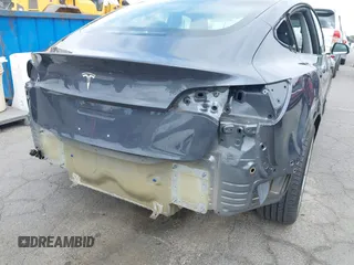 2018 Tesla Model 3 Long Range Battery with VIN 5YJ3E1EA8JF059385, listed as a IAAI auction lot 42116589 with 63,630 mi miles and . Bid and sale history available at DreamBid. Image 6.