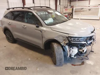 2023 Kia Sorento SX z VIN 5XYRKDLF9PG171214, wystawiony jako IAAI lot #41409304 z przebiegiem 23 131 mil mil oraz . Historia ofert i sprzedaży dostępna na DreamBid. Obrazek 1.