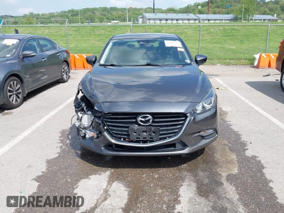 2018 Mazda 3 Touring z VIN 3MZBN1L35JM271525, wystawiony jako IAAI lot #42112552 z przebiegiem 107 299 mil mil oraz . Historia ofert i sprzedaży dostępna na DreamBid. Obrazek 12.