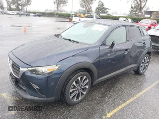 2019 Mazda CX-3 Touring with VIN JM1DKDC79K0424436, listed as a IAAI auction lot 41579280 with 76,989 mi miles. Bid and sale history available at carsss.com. Image 2.