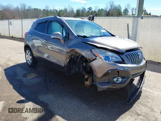 2014 Buick Encore Leather with VIN KL4CJCSB4EB700801, listed as a IAAI auction lot 41729506 with 115,601 mi miles. Bid and sale history available at carsss.com. Image 1.