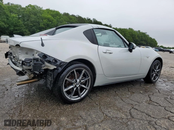 2017 Mazda MX-5 Miata Grand Touring z VIN JM1NDAM70H0104393, wystawiony jako Copart lot #58081805 z przebiegiem 76 279 mil mil oraz Szkoda całkowita • Salvage title. Historia ofert i sprzedaży dostępna na DreamBid. Obrazek 3.