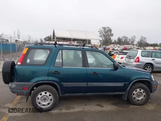 1998 Honda CR-V LX z VIN JHLRD1749WC068852, wystawiony jako IAAI lot #41915089 z przebiegiem 241 163 mil mil oraz . Historia ofert i sprzedaży dostępna na DreamBid. Obrazek 13.