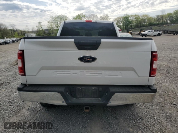2019 Ford F-150 XL with VIN 1FTFW1E51KFC28124, listed as a Copart auction lot 54140585 with 14,881 mi miles and Salvage Title. Bid and sale history available at carsss.com. Image 6.