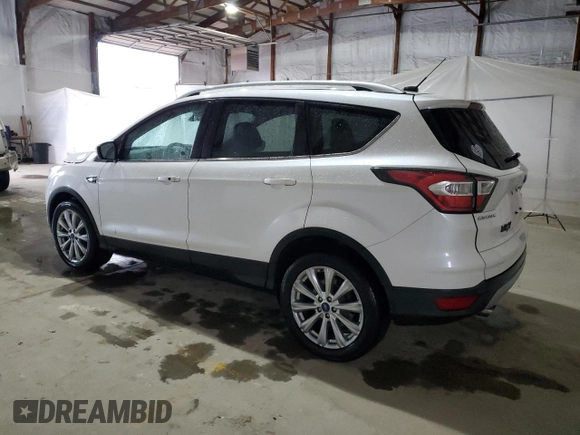 2017 Ford Escape Titanium with VIN 1FMCU0J96HUB31397, listed as a Copart auction lot 50970835 with 127,598 mi miles and Salvage Title. Bid and sale history available at carsss.com. Image 2.
