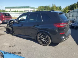 2020 BMW X5 M50i with VIN 5UXJU4C05LL228167, listed as a Copart auction lot 70390194 with Not Provided miles and Salvage Title. Bid and sale history available at DreamBid. Image 2.