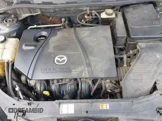 2005 Mazda 3 s with VIN JM1BK343151259901, listed as a IAAI auction lot 42028513 with 209,689 mi miles. Bid and sale history available at carsss.com. Image 10.